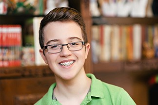 Teen Boy with Glasses and Braces